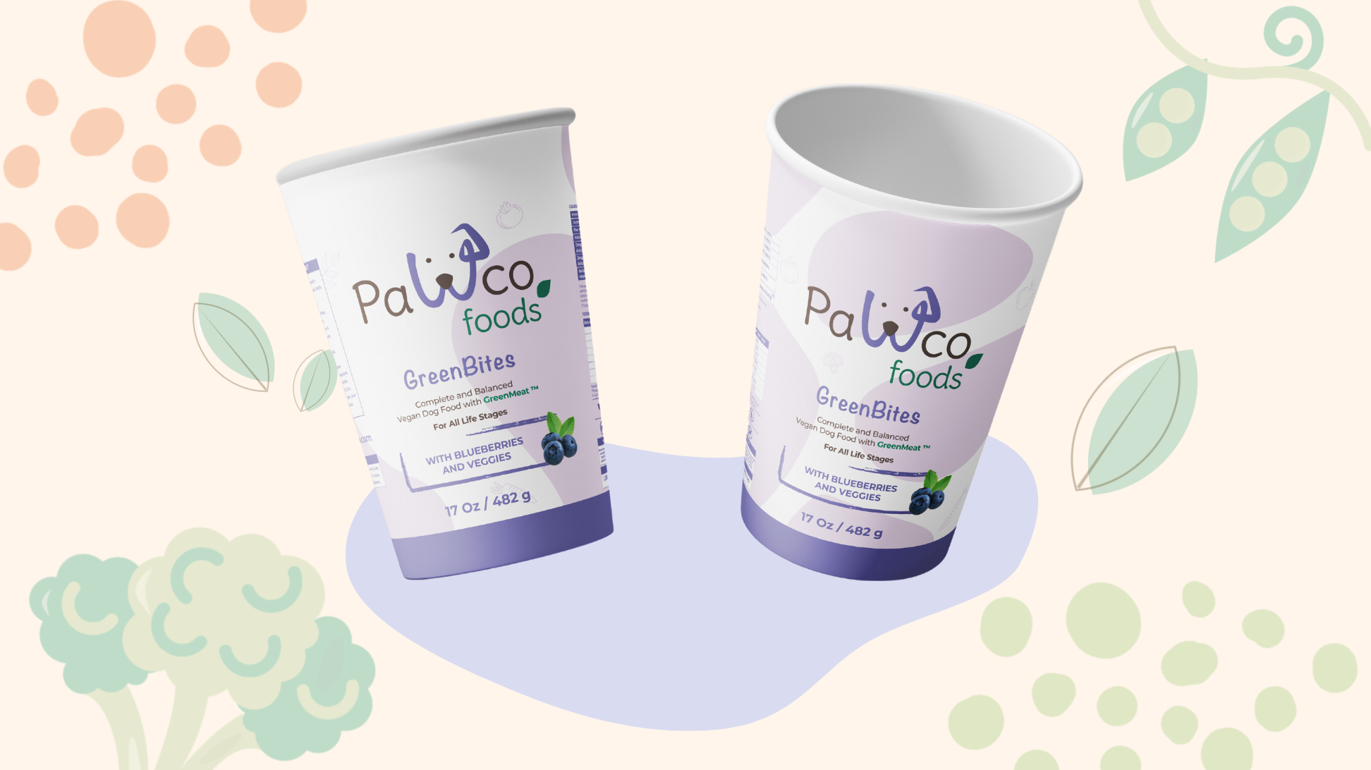 The image shows PawCo's GreenBites Blueberries & Veggies packaging against a background with various vegetable illustrations.