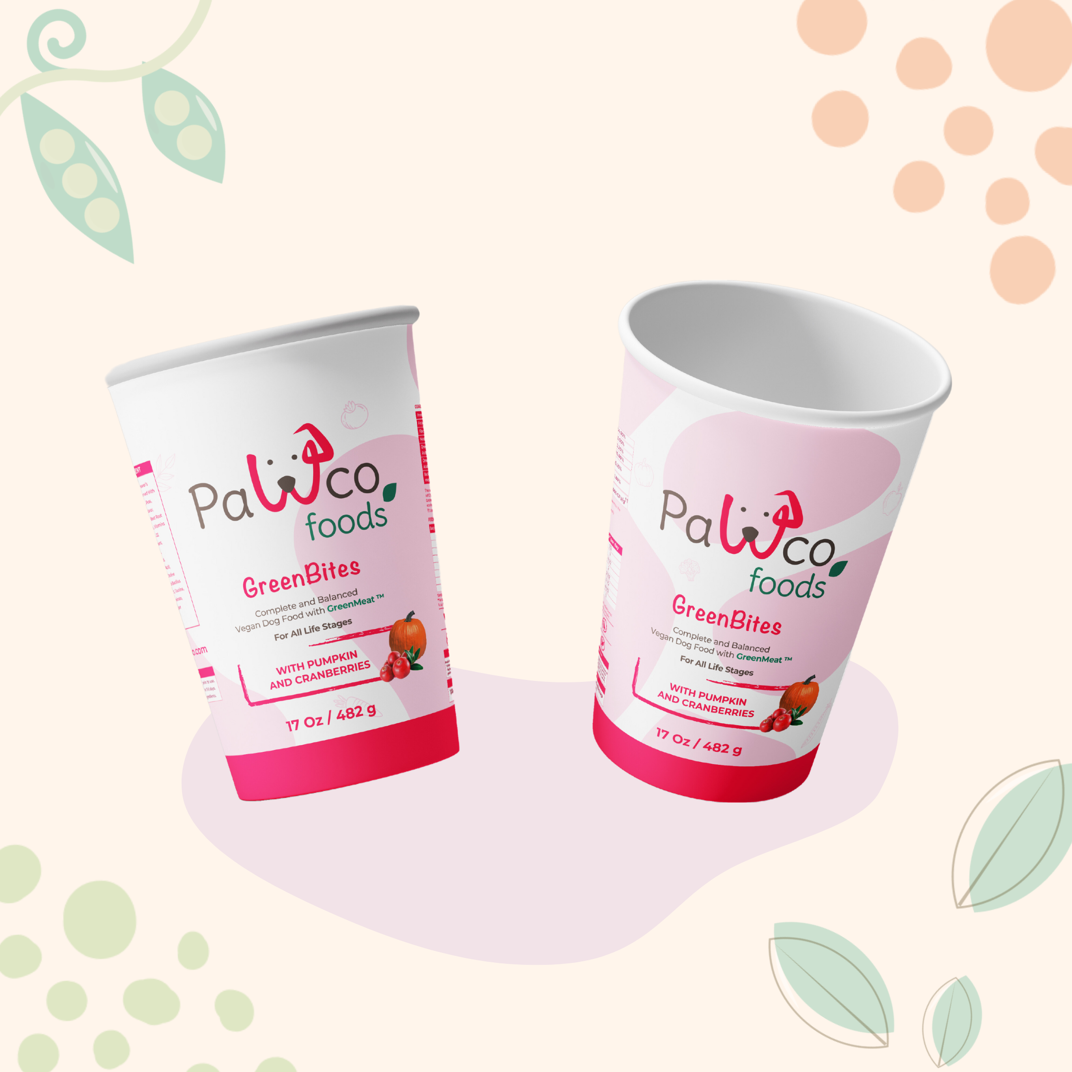 The image shows PawCo's GreenBites Pumpkin & Cranberries packaging against a background with various vegetable illustrations.